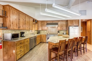 Newly remodeled kitchen with 8 burner stove, 2 ovens and 2 dishwashers