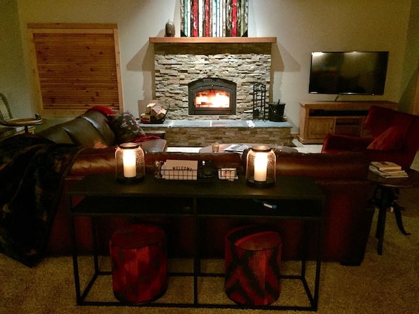 With a fire going, the living room is extra cozy at night.