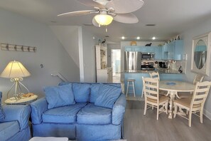 Open concept to have space and time together. Living/dining areas.