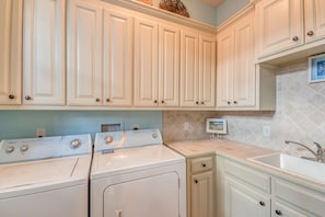1st floor Laundry Room off the kitchen & entrance from outdoor shower station