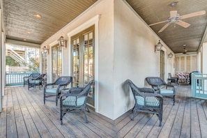 Wrap around porch 1st floor, plenty of seating, ceiling fans, 4 bikes, gas grill