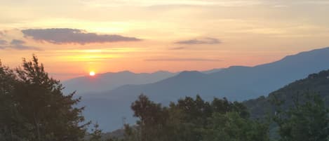 Beautiful sunrise over the mountains from our patio.