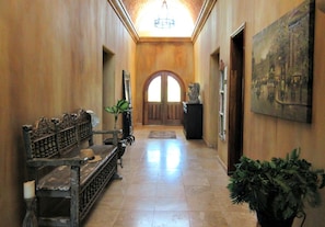 View of entry hallway from great room to front door.
