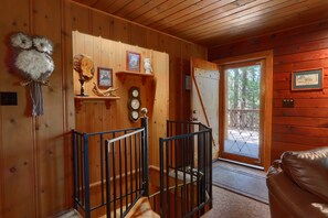 The entryway and staircase going downstairs