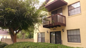 Balcony from master bedroom overlooks the waterfront lagoon to Lake Harris Chain