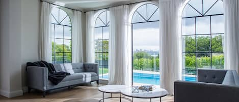 Sun filled living area opening onto the pool