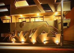 concrete graffiti facade of whole apartment building 