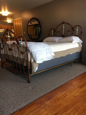 Sweet dreams in this queen size ornate iron bed.