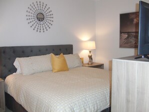 Master bedroom with King Sized bed and HD Television