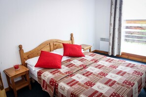 Drift to sleep in this plush Double bed in the master bedroom.
