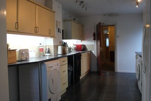 Large kitchen/ dining room, fully equipped.