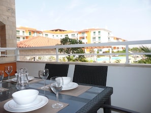 Alfresco dining overlooking the pool