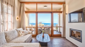 Living room and balcony with sea view