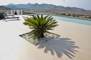 Large swimming pool terrace with outstanding views