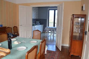 The dining room leads through to the kitchen