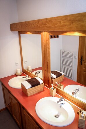Get ready for the day in the bright bathroom.