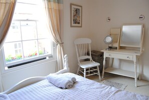 Master bedroom with views overlooking the High Street