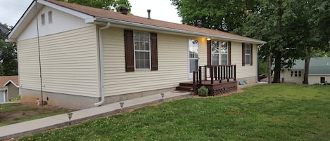 Huge front lawn and parking area.