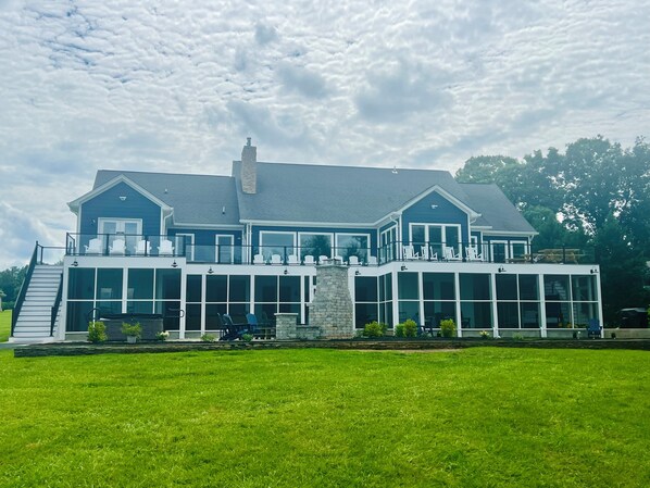 Almost 5k sqft of outdoor living: deck, screen porch, two patios, and boathouse