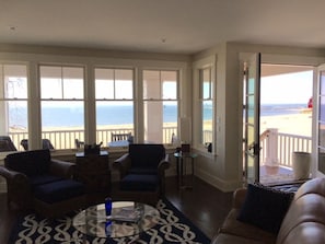 Living Room With View Of Holland's Big Red Light House