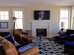 Living Room With Fire Place and Samsung - 60' - LED - Smart - HDTV