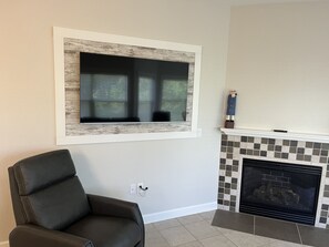 55” SmartTV and fireplace