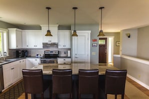 Kitchen on main floor is fully furnished.