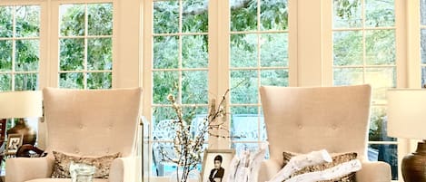 Gorgeous Living Room looking out onto deck and pool