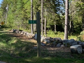 Rock wall in front of house