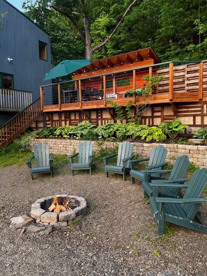 Lakeside fire pit with Adirondack chair seating for six!