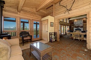 Front Door Entry into Sun Room With Gas Stove + Caribou Antler  Entry To Great