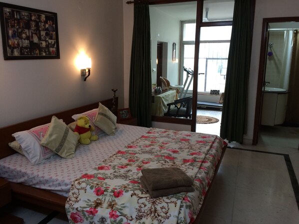 A king size bed in a decent size room