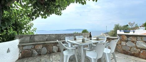 Villa CAMELIA:- The shady and panoramic veranda next to the kitchen.