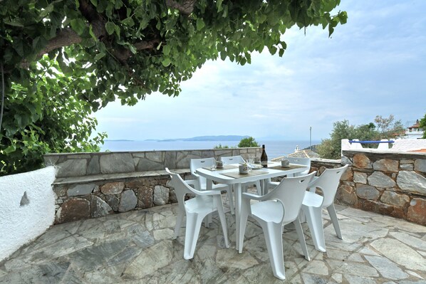 Villa CAMELIA:- The shady and panoramic veranda next to the kitchen.
