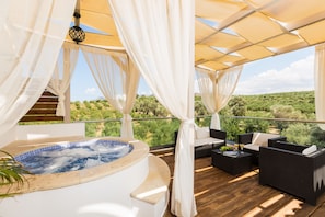 Enjoy the large balcony, complete with an Outdoor Spa Whirlpool