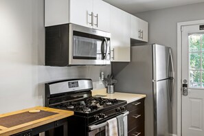 Brookwood Courtyard Condos - Complete Galley Kitchen with Full-Size Appliances