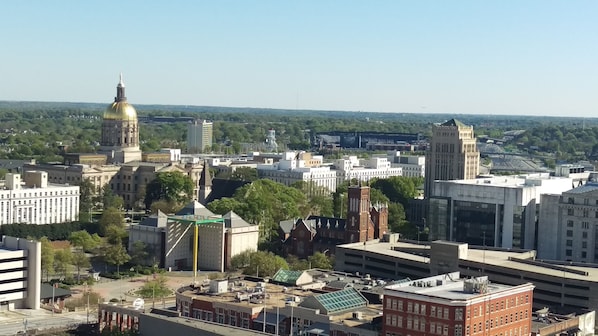 Unbelievable view from expansive roof-top patio to Capitol, Olympic cauldron ++