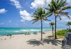 Beach in Front of Pool with stairs for free easy access  to the Beach