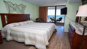 Our Master Features: A King Bed, Access to the Balcony,  WIC, Full Bath, TV/DVD.