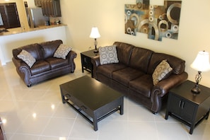 Living Room - That's a Queen sleeper sofa in that leather couch!