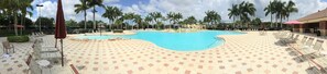 Pool 1: Resort-style with water features, changing rooms, chairs, and umbrellas.