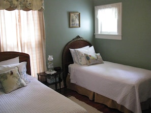 Two pillow top twin beds in back bedroom
