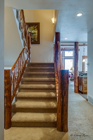Stairs leading down to the main living area level
