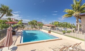 Heated pool is just steps away from the unit.