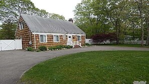Hamptons Cedar cape style home 