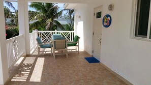 Wonderful front covered porch  provide
weather cover and seating
