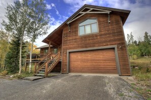 This property has a large driveway with room for 2-3 cars, plus a heated 2 car garage