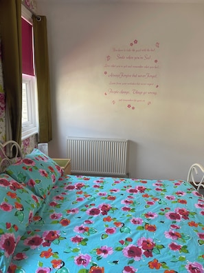 Bright and airy double bedroom. Emma mattress another Smart tv. Ample storage