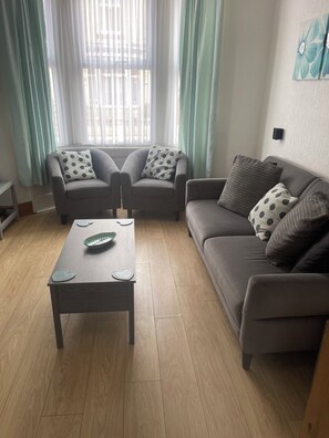 Spacious lounge with dining area. 50 inch Smart TV and fibre . Free Parking pass