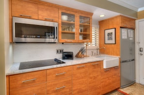 Enjoy daily meal preparation in this fully equipped kitchen.